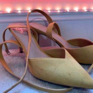 Yellow high heels